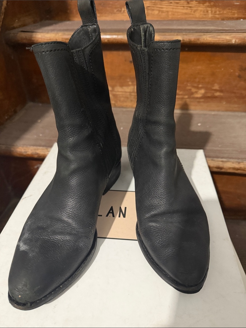 Sleek Black Leather Pull-On Ankle Booties